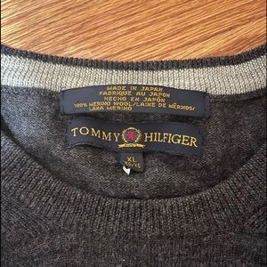 a mens sweater charcoal color.  size is XL but accurate size is L due to brand